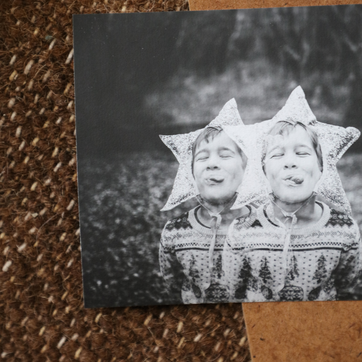 Double exposure print of a boy wearing a star bonnet printed on slightly textured canson edition etching fine art paper