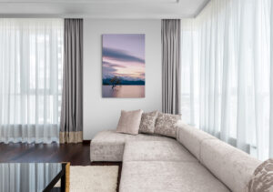 Canvas print fo a tree in a lake printed large hanging on a wall in hamptons style lounge room