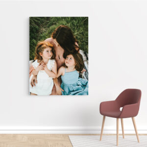 Large canvas print of family hanging on wall
