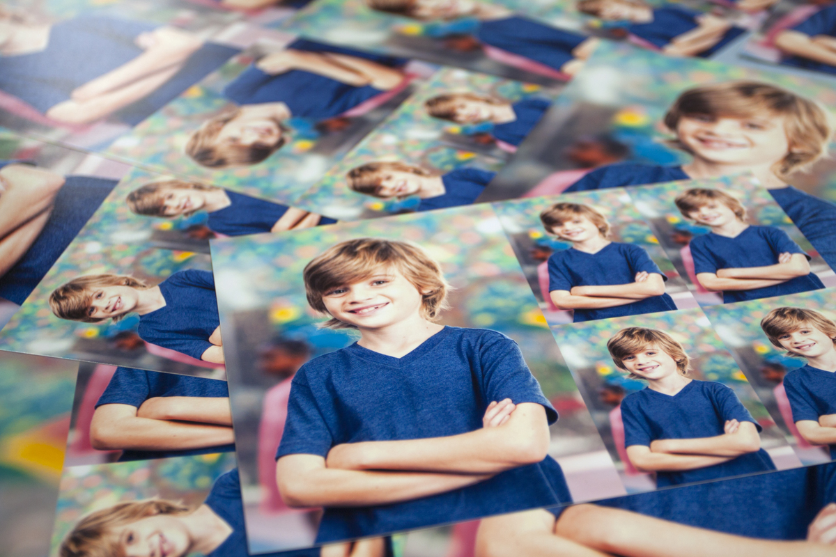Pile of school photo package prints on lustre photo paper